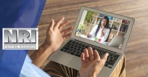 A virtual meeting on a laptop